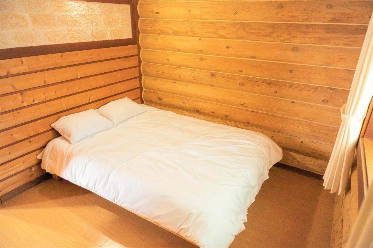 Jungmun Log Pension & Resort Σεογκουίπο Εξωτερικό φωτογραφία